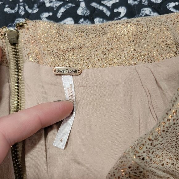 Freeā
Peopleā
MetallicĀ Miniā
Skirt - Picture 6 of 7